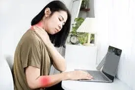 a woman with neck pain